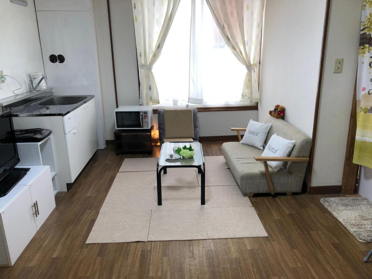 Happy Apartment Sapporo Bagian luar foto