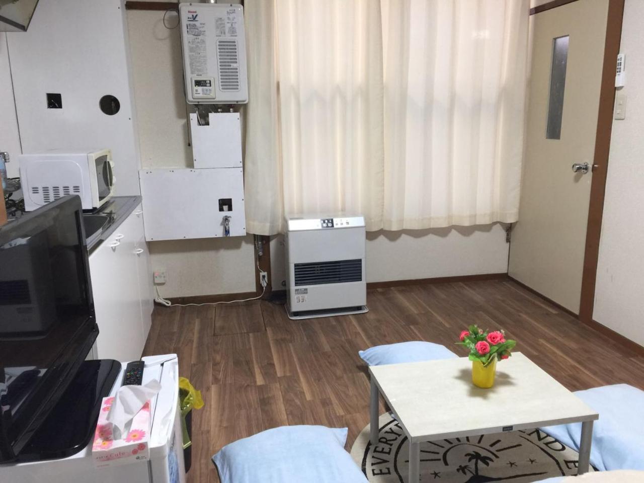 Happy Apartment Sapporo Bagian luar foto